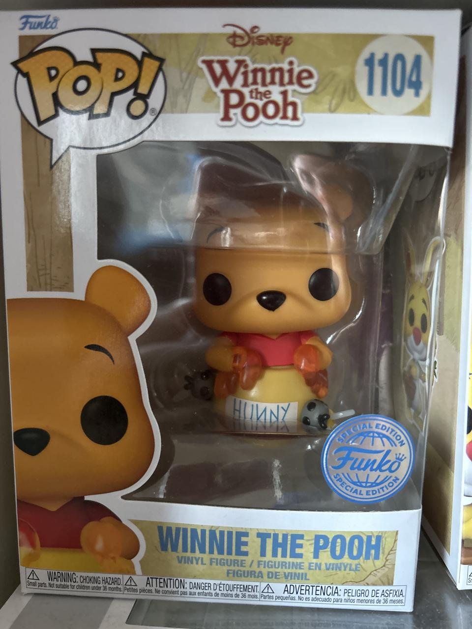 Winnie l'Ourson dans le Pot de Miel