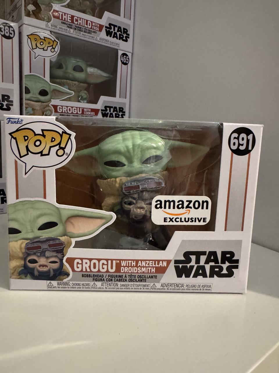 Grogu with Anzellan Droidsmith