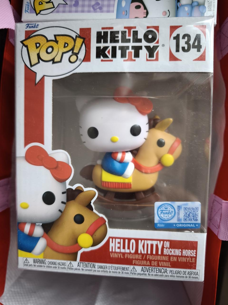 Hello Kitty on Rocking Horse